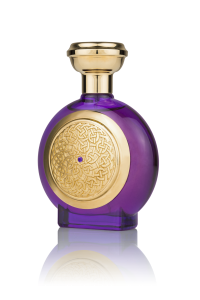 Boadicea Perfume's iconic gold shield adorned by a violet sapphire