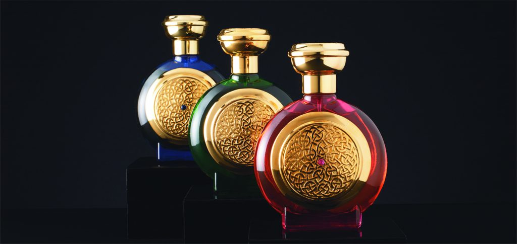 Luxury bottles of perfume with pewter celtic shields 